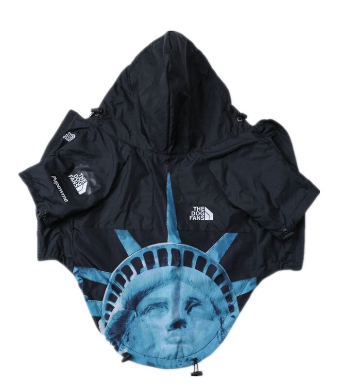 Black Supreme North Face inspired dog windbreaker with Liberty graphic on flat lay