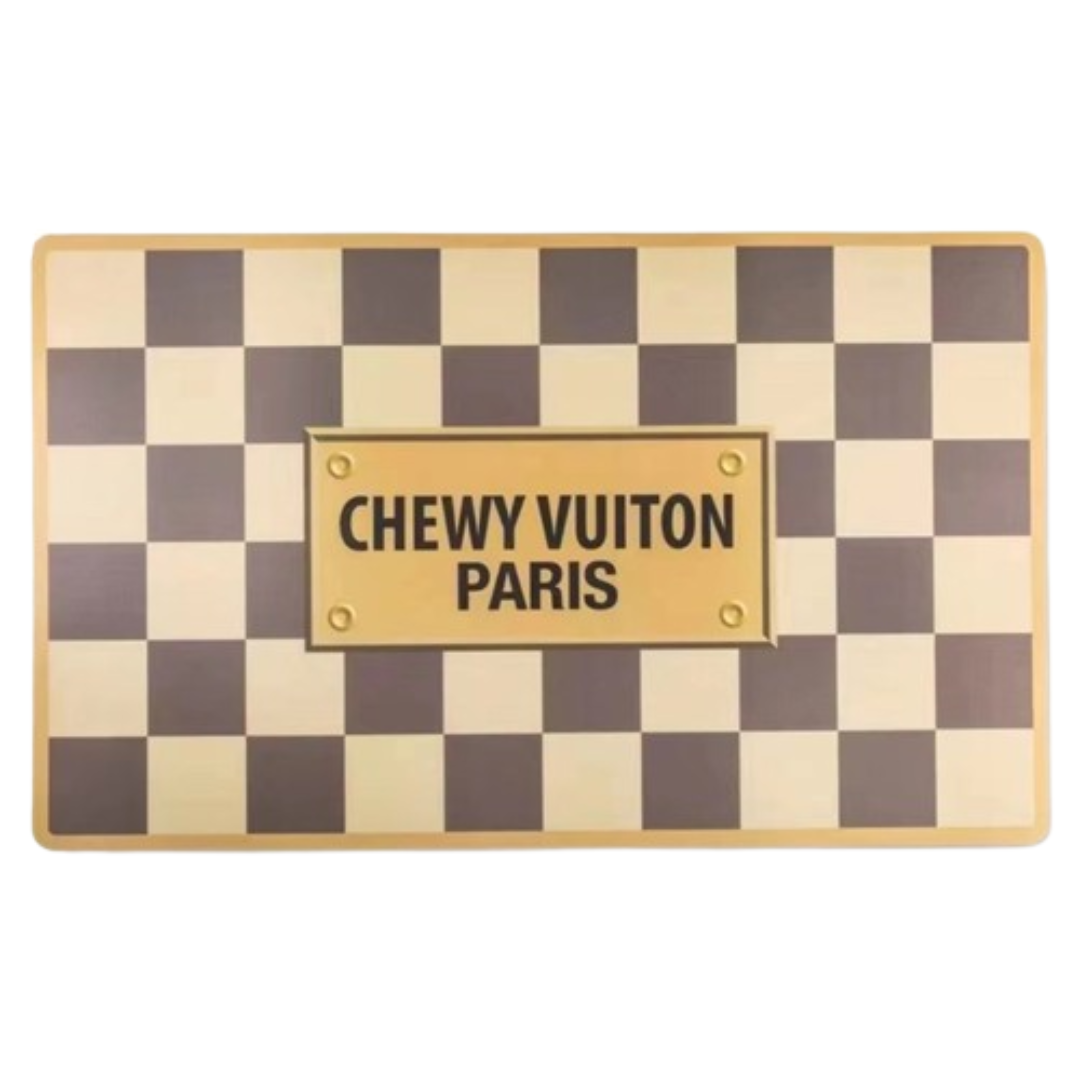 Brown checkered dog placemat with Chewy Vuitton branding Louis Vuitton parody