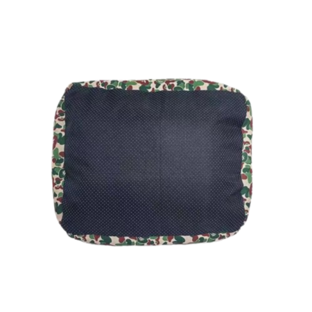 Bottom view showing non-slip textured base of camo dog bed