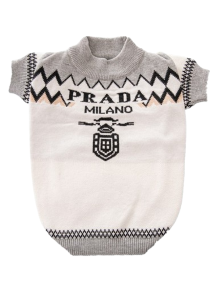 Close-up white knit dog sweater geometric pattern Prada style with shield logo detail