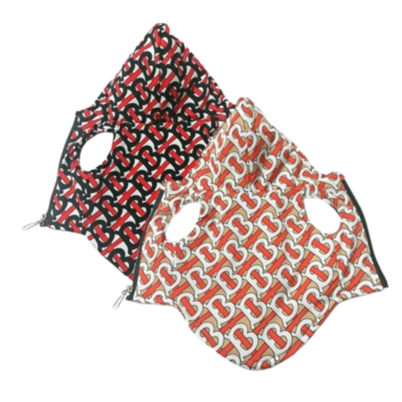 Brown and black Furberry monogram quilted dog vests Burberry style TB print flat lay