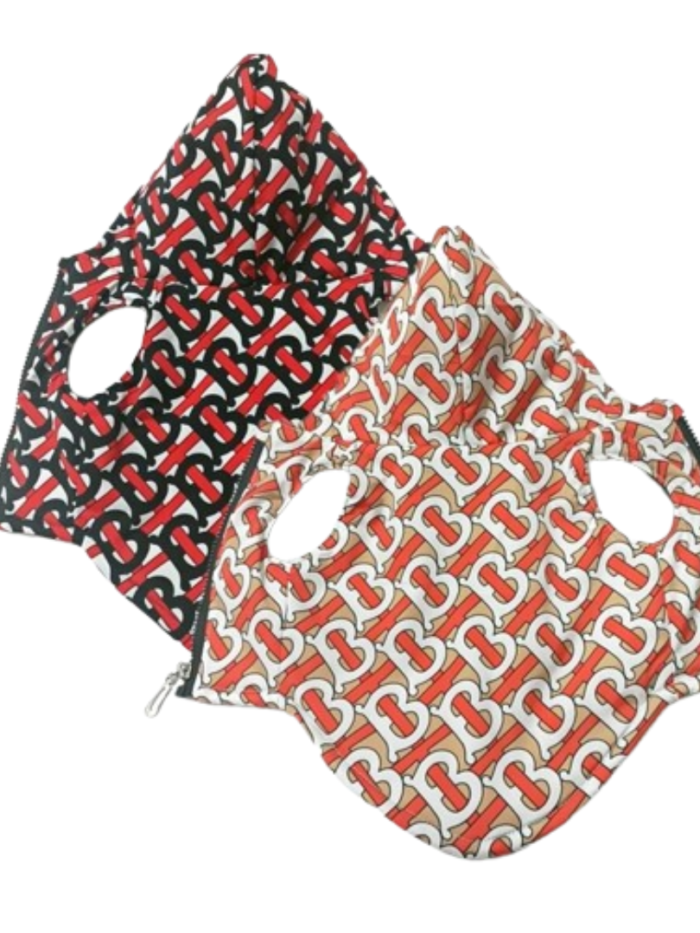 Brown and black Furberry monogram quilted dog vests Burberry style TB print flat lay