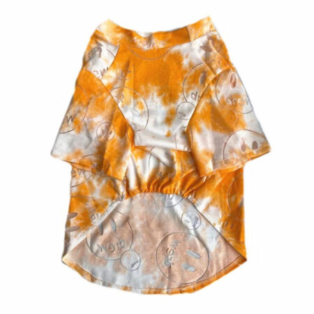 Orange and white tie dye dog tee with Drew smiley face graphics on white background