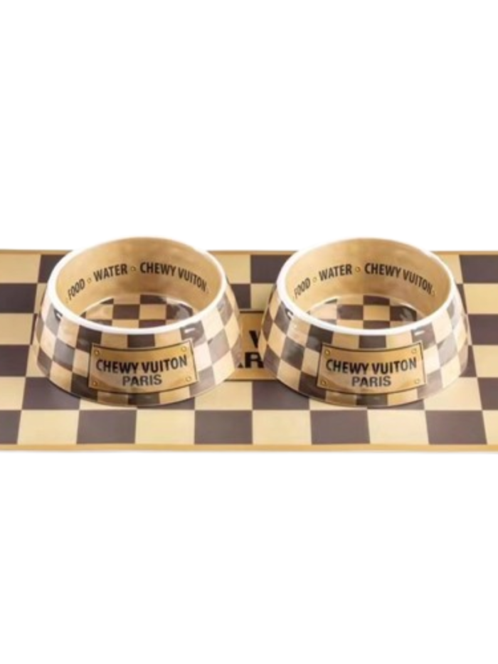 Two checkered dog bowls on matching placemat with Louis Vuitton style pattern