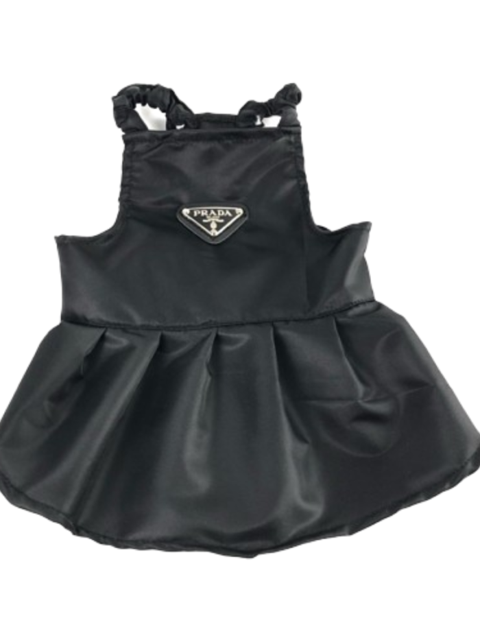 Black pleated dog dress with triangular Prada logo on chest and ruffle straps