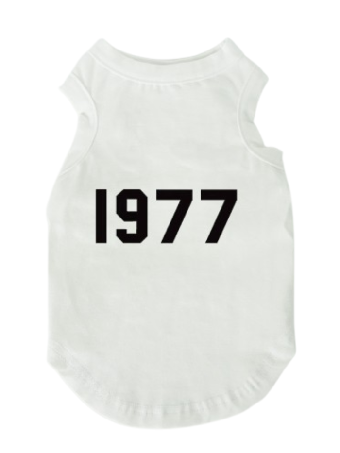 White sleeveless dog tee with black 1977 typography athletic style