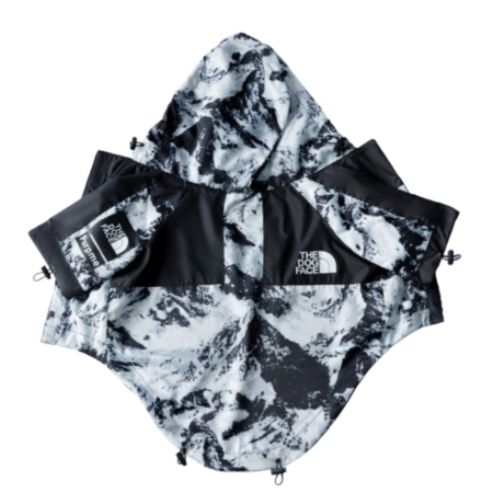Black and white mountain print dog jacket with hood flat lay