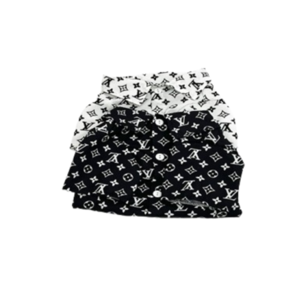 White and black V monogram polo shirts stacked showing collar detail