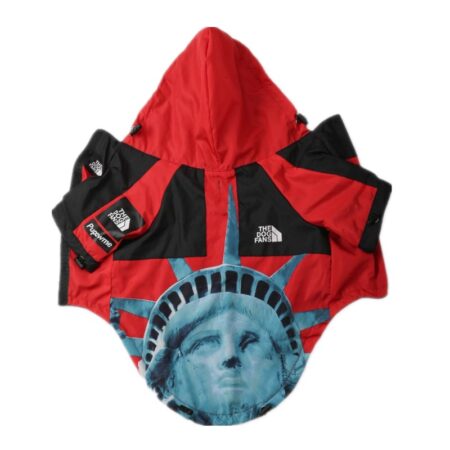 Red and black Supreme North Face style dog windbreaker with Statue of Liberty print