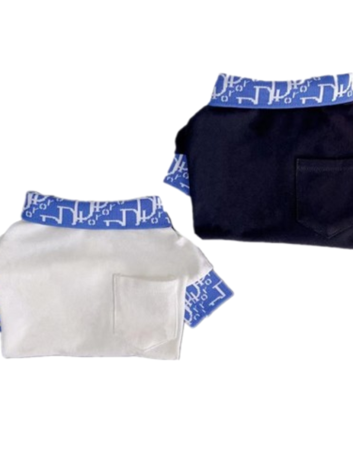 Navy dog polo with blue Dior Oblique print collar and sleeves on white background