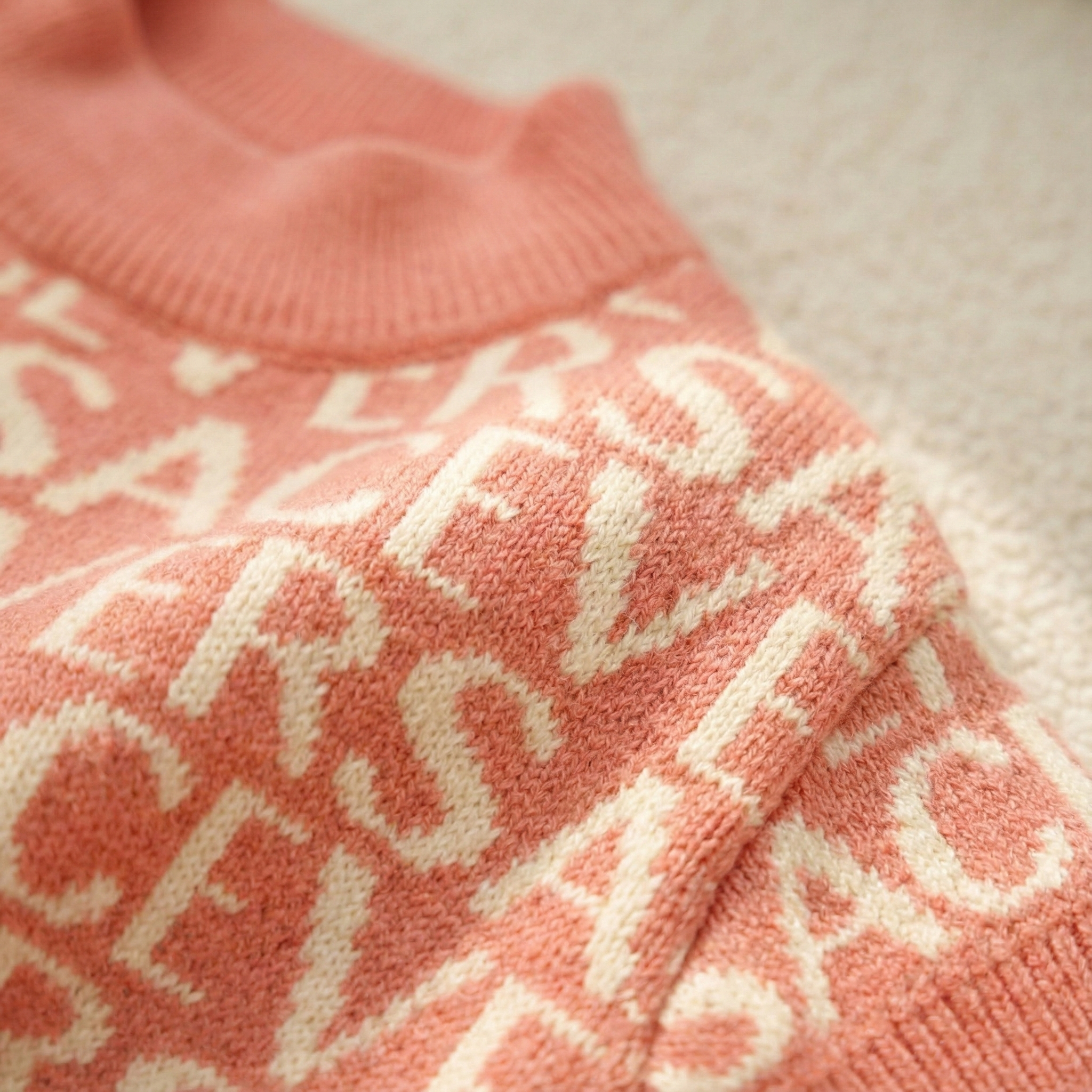 Pawsace All-Over Logo Sweater