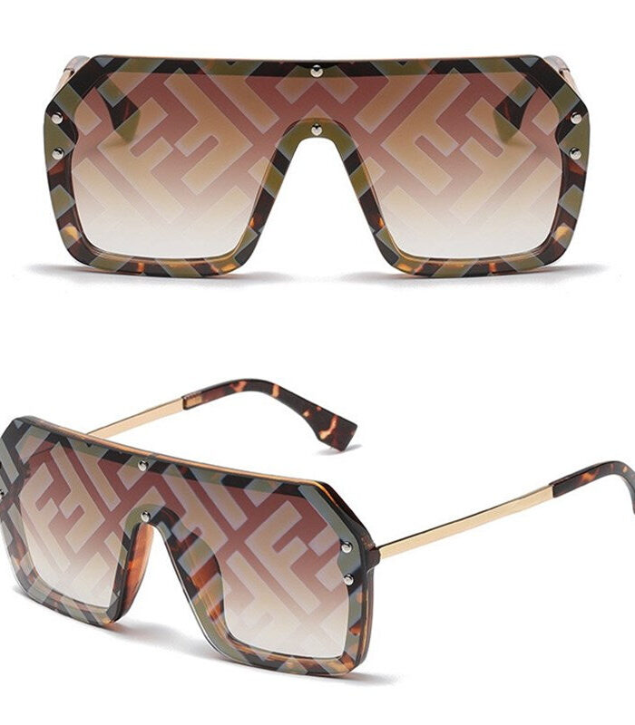 Brown gradient dog sunglasses with geometric monogram pattern and gold temples