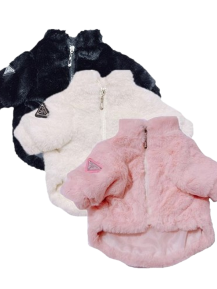 Three faux fur dog jackets in black white and pink with Prada inspired triangle logo patches