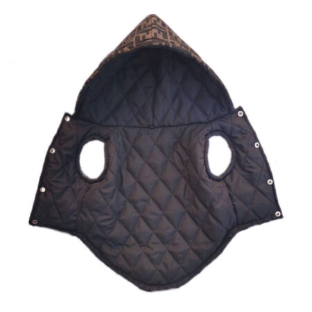 Interior view of quilted dog vest showing diamond stitch pattern and snap button details