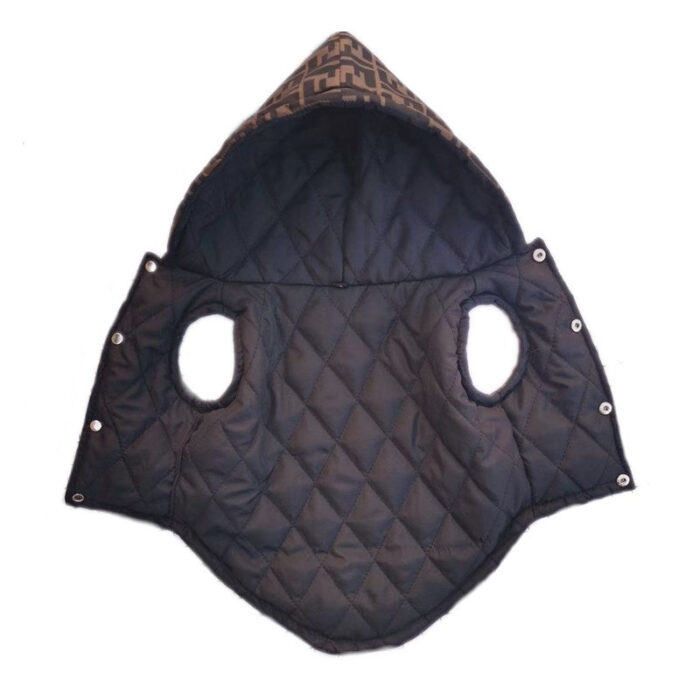 Interior view of quilted dog vest showing diamond stitch pattern and snap button details