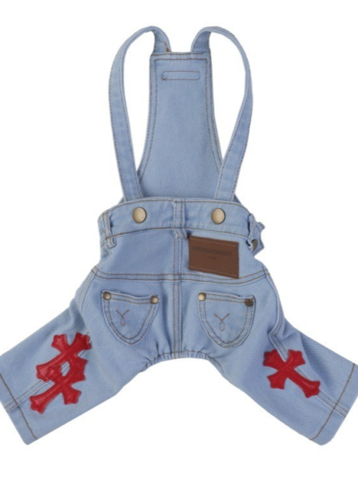 Light blue denim dog overalls with red cross patches Chrome Hearts inspired flat lay