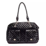 Black quilted dog carrier with diamond pattern and chain handles inspired by Chanel