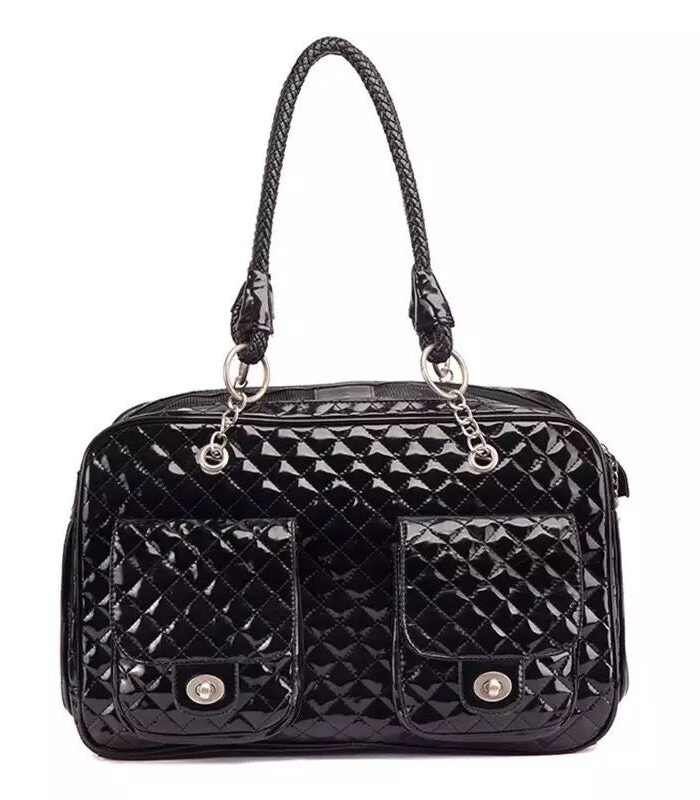 Black quilted dog carrier with diamond pattern and chain handles inspired by Chanel