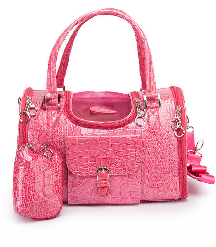 Pink crocodile textured luxury dog carrier with matching waste bag holder