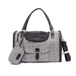 White crocodile pattern dog carrier with dual carrying handles and shoulder strap