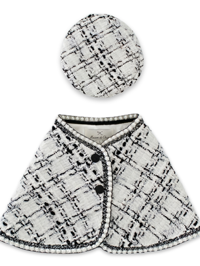 White bouclé tweed dog cape with black pearl trim and coordinating beret Chanel style