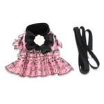 Pink tweed dog harness dress with ruffled skirt and matching leash