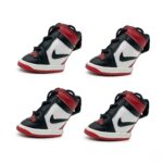 Side view Air Bud dog sneakers showing high-top silhouette padded collar and rubber sole