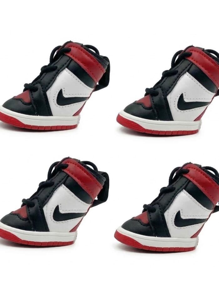 Side view Air Bud dog sneakers showing high-top silhouette padded collar and rubber sole