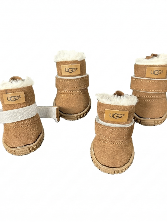 Set of four tan suede dog boots with white sherpa lining and velcro straps UGG style winter boots