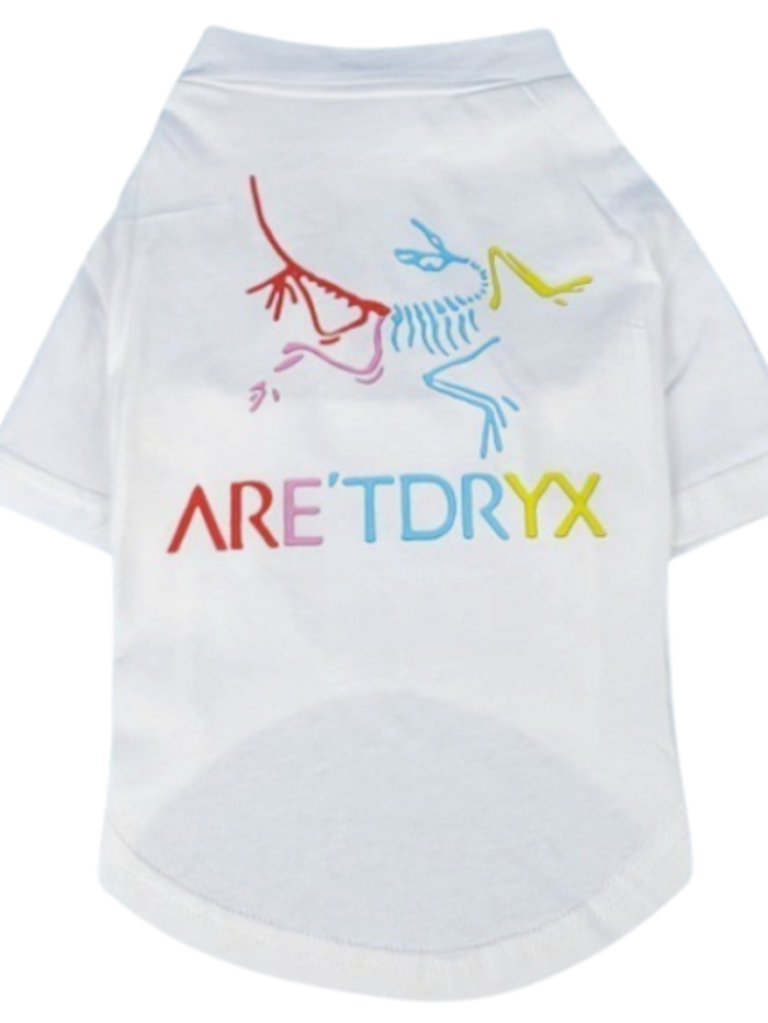 White dog tee with rainbow skeletal bird graphic and Bark'teryx branding