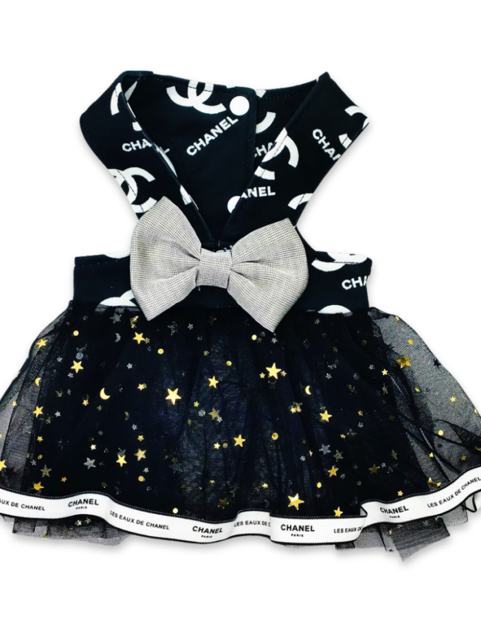Black tulle dog dress with gold stars and Chanel-inspired logo bodice with checkered bow