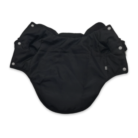 Quilted dog vest flat lay showing diamond stitch pattern and ribbed cuffs