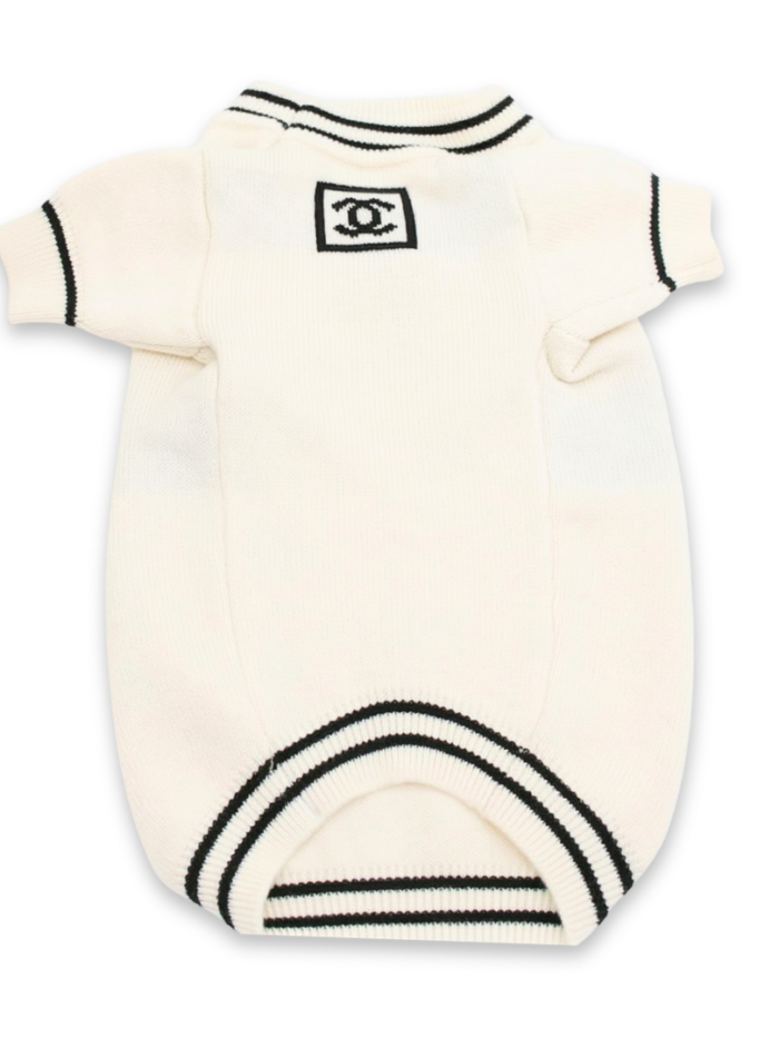 Back view cream dog sweater with interlocking Chanel logo patch on collar