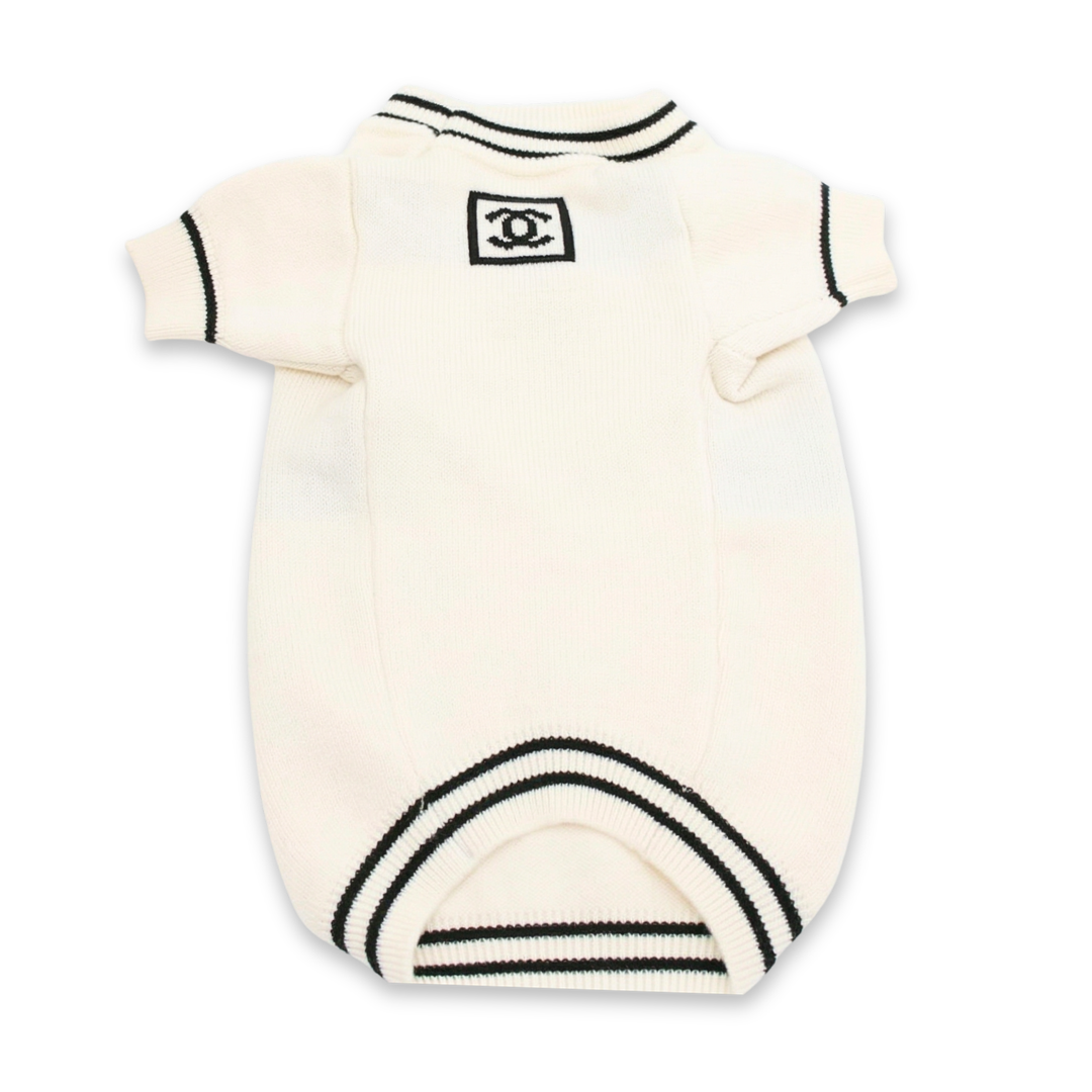 Back view cream dog sweater with interlocking Chanel logo patch on collar