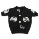 Black knit dog cardigan with white fringe Chanel logo details and gold buttons