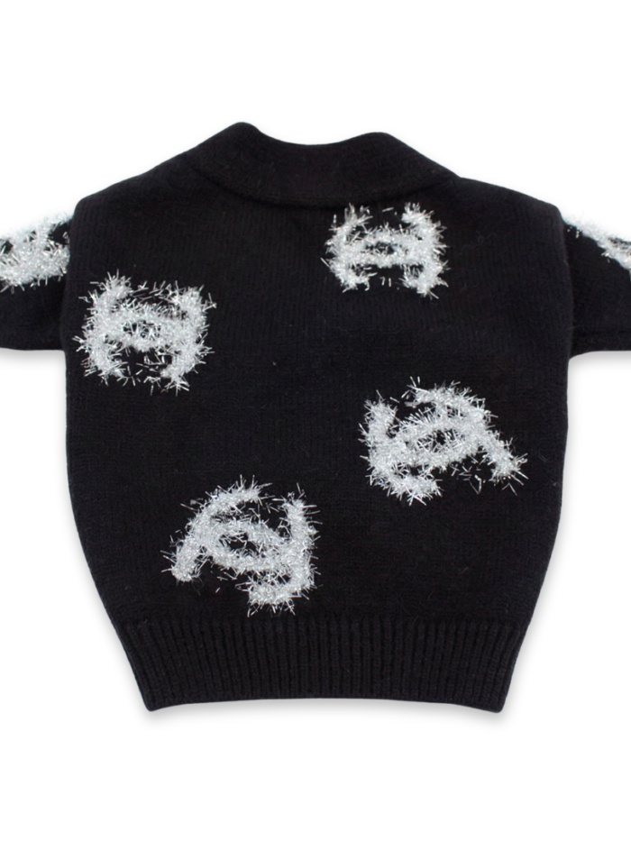 Back view of black Chanel inspired dog cardigan showing fringe logo pattern