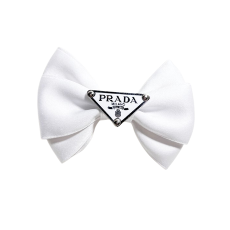 White satin dog hair bow with Prada triangle logo detail on white background