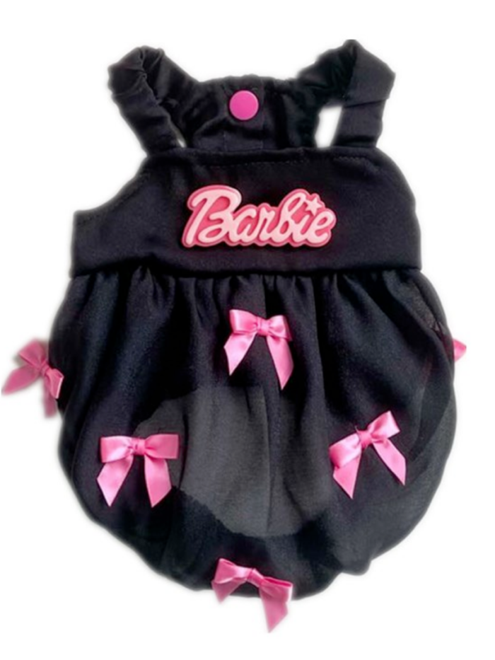Black sleeveless dog dress with pink Barbie logo and multiple pink bow details