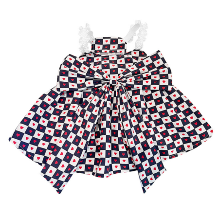 Black and white checkered dog dress with red hearts Comme des Garcons CDG style flat lay