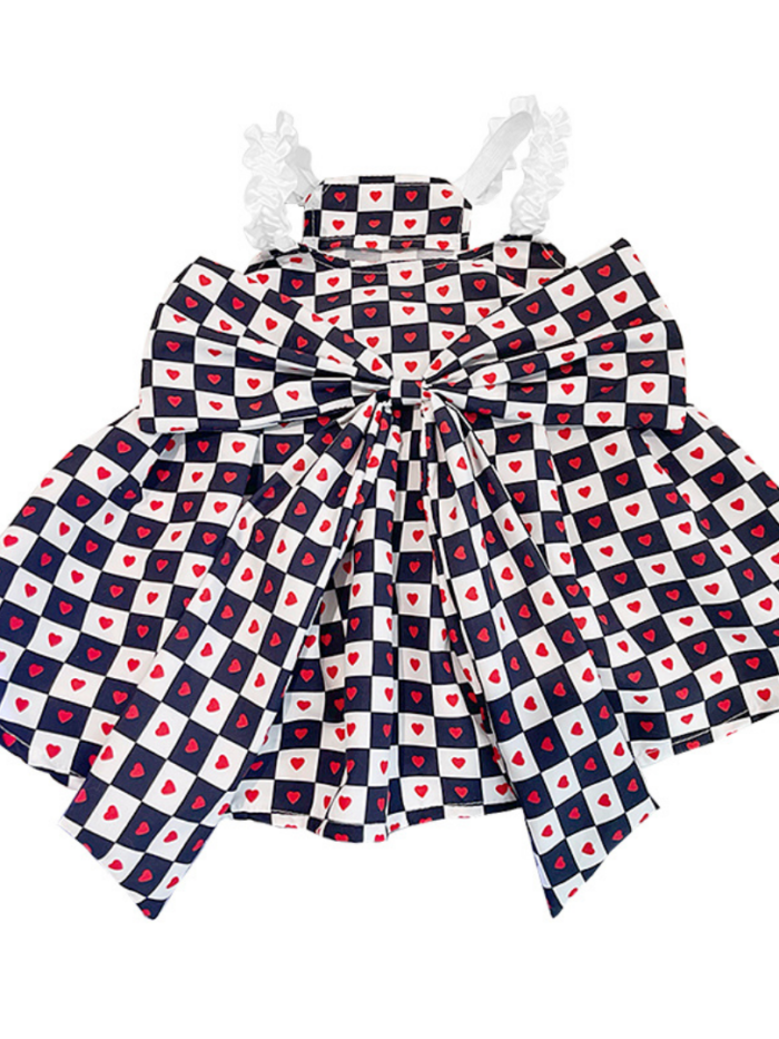 Black and white checkered dog dress with red hearts Comme des Garcons CDG style flat lay