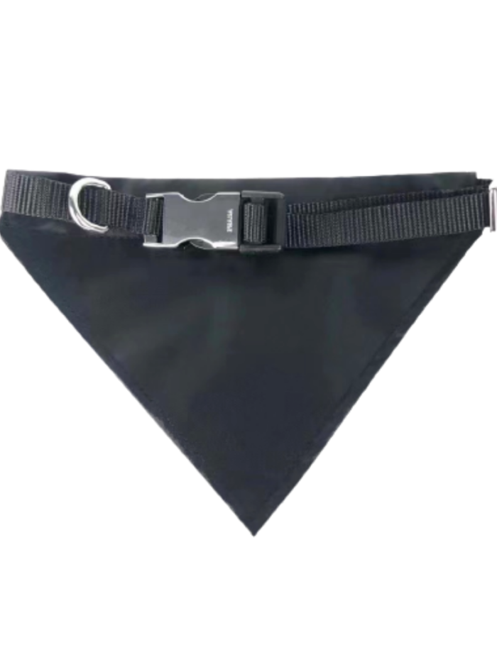 Black nylon dog bandana flat lay showing aluminum buckle and triangle Prada logo