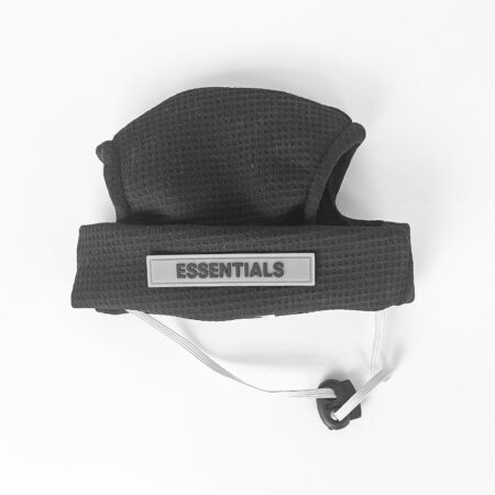 Black waffle textured dog bucket hat with ESSENTIALS branding and adjustable chin strap