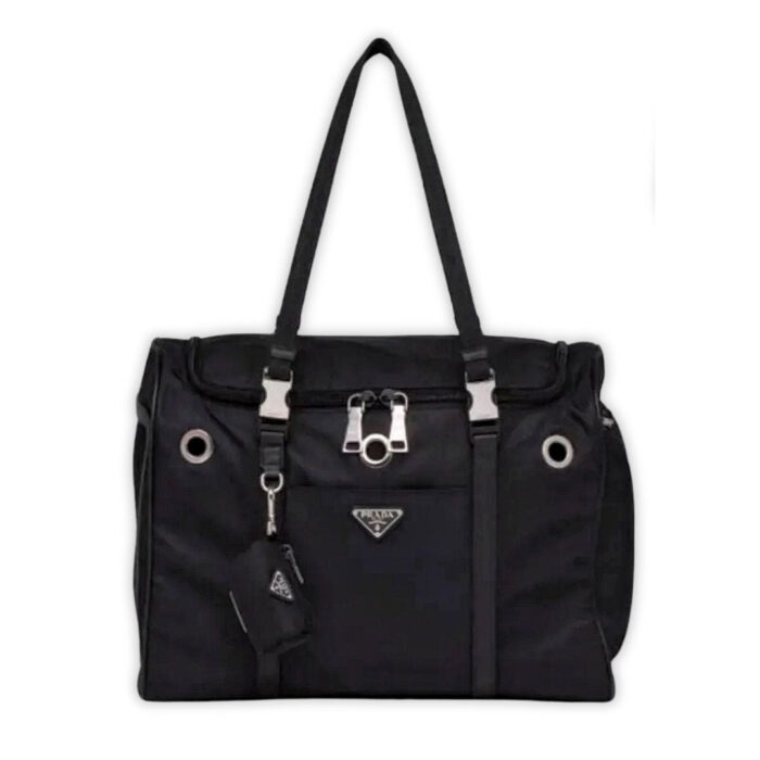 Black nylon dog travel carrier with Prada triangle logo and mesh ventilation panels