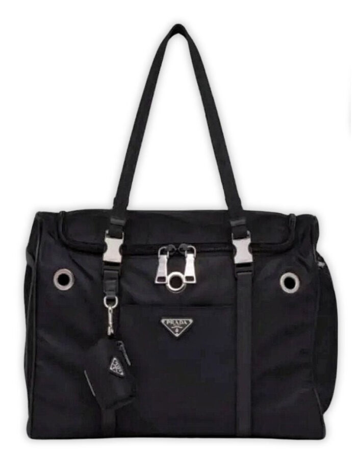 Black nylon dog travel carrier with Prada triangle logo and mesh ventilation panels