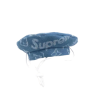 Blue denim-style dog beret with monogram pattern and chin strap closure