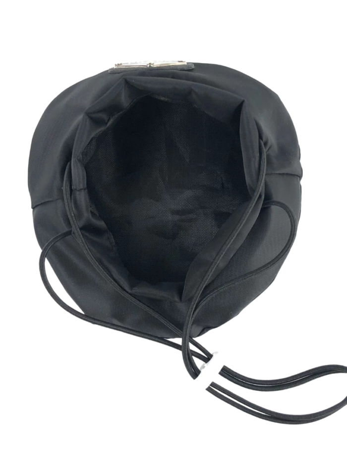 Black dog beret opened showing mesh interior lining and elastic cord system