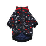 Black monogram dog bomber jacket with red hearts and striped ribbed collar