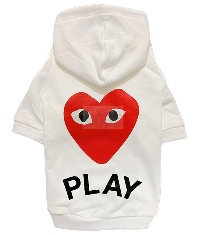 White dog hoodie with red heart-with-eyes logo and PLAY text on back CDG inspired