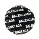 Black faux fur dog bed with white Balenciaga logo print all over surface