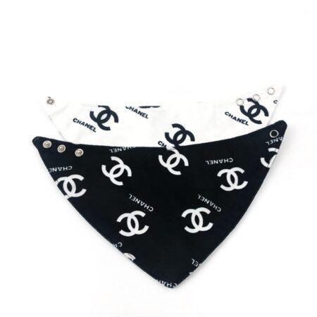 Black and white triangle dog bandanas with Chanel logo print and snap closures